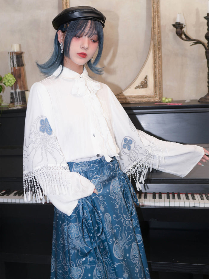 ‘Blue Tears’ printed white shirt with Peter Pan collar and layered sleeves