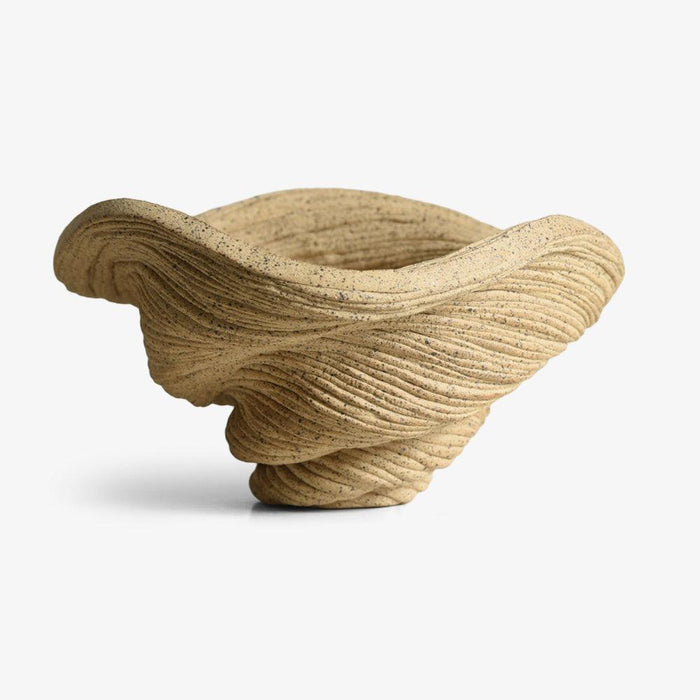 Coiled tan porcelain small bowl sculpture with an organic wavy shape and visible horizontal textures