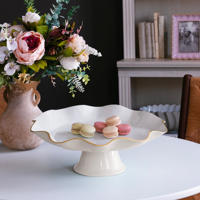 Beatriz Ball Encanto Carola Pedestal Cake Plate — With macarons beside flowers