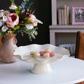 Beatriz Ball Encanto Carola Pedestal Cake Plate — With macarons beside flowers