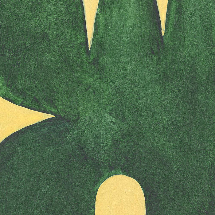 Close-up of a dark green abstract blob-like shape with pointed peaks and a curved cutout on a yellow background
