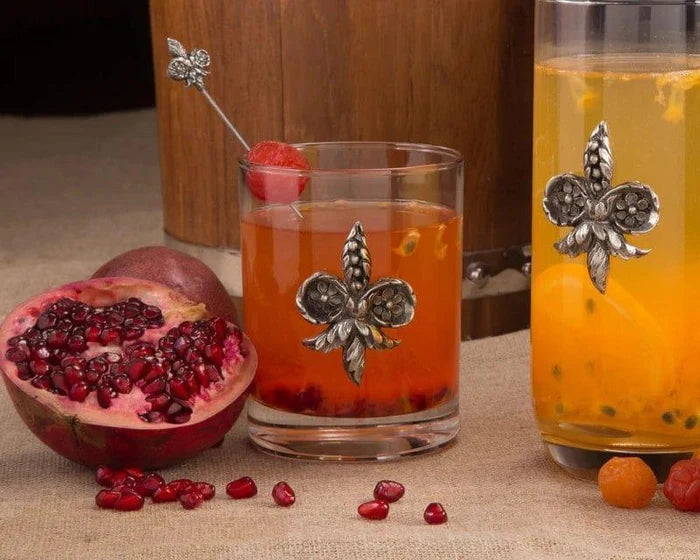 Bar glasses embellished with pewter fleur de lis emblems - Your Western Decor