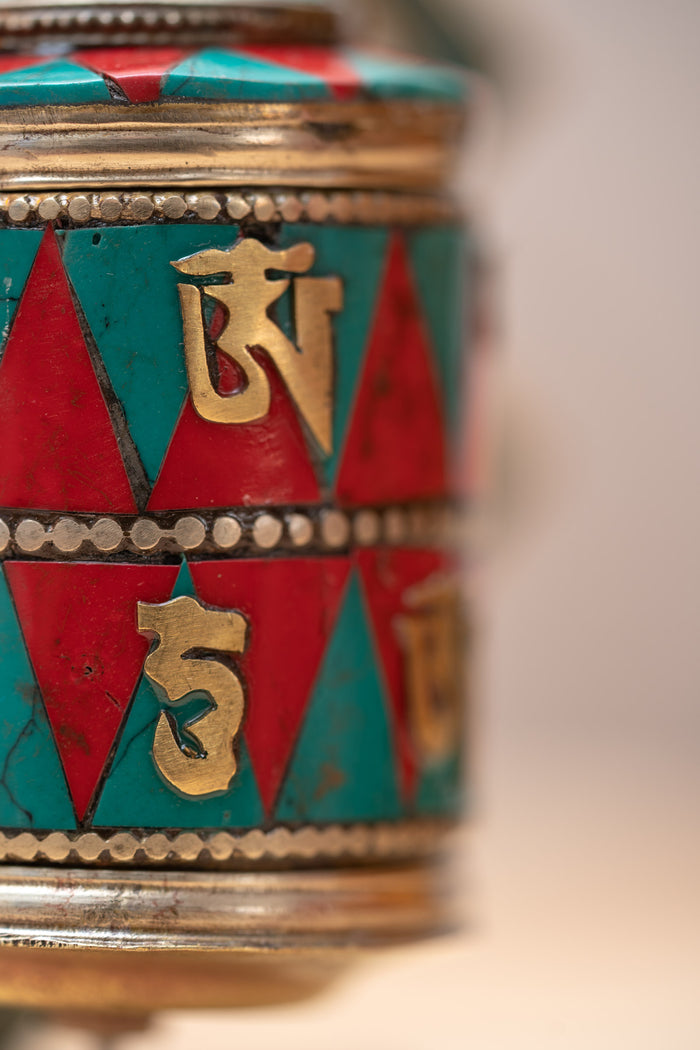 Endless Knot Prayer Wheel serves as a means to cultivate mindfulness and focus.